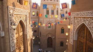 ![Image](https://images.openai.com/static-rsc-3/1D_8HaABwOE_YoLGMA7TLtJ-5Pz3smFB_jSrGKWEp2ydrLmMREWz6LDn_MlQujwnaWxO5mCNWTlJBJLwu-SYm7zxrd2La7a9Rjcp_UNsz5k?purpose=fullsize\&v=1)

![Image](https://images.openai.com/static-rsc-3/d0S2oaaQaM1FIw2RuSlK8YkrCRWdA8hk8SrGHO6nckQfDZoWjytutOtfV69WG61Gx5YNpr1naHLT8p9TL8EUj19VDKpHBxs_VXod5JGFcX8?purpose=fullsize\&v=1)

![Image](https://cdn.freepixel.com/preview/free-photos-a-happy-child-african-muslim-girl-is-holding-a-lantern-in-her-hands-she-is-wearing-a-headscarf-and-a-preview-1004287635.jpg)

![Image](https://cdn.freepixel.com/preview/free-photos-eid-mubarak-arab-kids-photo-two-young-boys-dressed-in-traditional-clothing-while-standing-next-to-ea-preview-1004191140.jpg)

## فكرة المشهد

بعد نزول الكاميرا إلى الأزقة المزينة، تبدأ الحياة بالظهور:

* أطفال يضحكون ويلعبون
* ملابس يمنية تقليدية
* زينة العيد فوق الأزقة
* أجواء صباح العيد

لكن *الشخصيات تكون كرتونية* بينما *البيئة واقعية*.

---

Cinematic scene in the decorated alleys of Old Sana'a during Eid morning. 
Traditional Yemeni alley with mud-brick tower houses, white gypsum decorations and colorful windows. 
Festive lanterns and Eid decorations hanging across the street. 

Cartoon-style Yemeni children appear playing and celebrating Eid in the alley. 
Children wearing traditional Yemeni clothing, colorful dresses for girls and traditional outfits for boys. 
They laugh, run and greet each other happily. 

The environment remains realistic Old Sana'a architecture while the children are stylized cartoon animation characters. 
Warm morning sunlight, joyful festive atmosphere, cinematic camera movement, highly detailed, 4K.