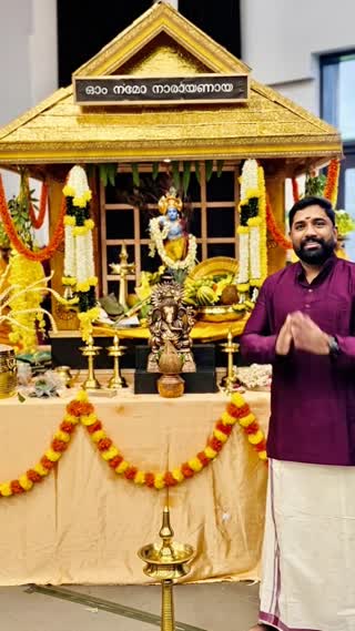 Please make a beautiful Vishu wishes in Malayalam with this image by keeping the exact face look of the man and keeping the same outfit