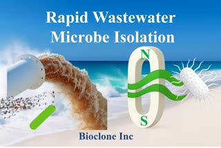 • All text stays perfectly still.
• Wastewater flows continuously.
• Microbes move from the left in a windstorm along the blue magnetic waves.
• As they reach the right, microbes transform into a single large white rod-shaped E. coli with pili.
• The magnet disappears; the E. coli becomes the main focus.
• A strong ocean wave keeps moving in the background.