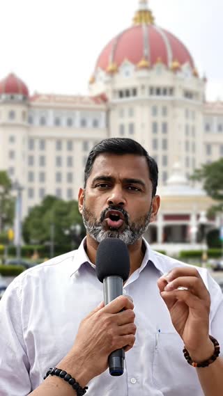The men looks directly at the camera, speaking in Hindi with minimal, expressive hand gestures, emphasizing his points with an empathetic but unwavering gaze. say whole word
 He says: "बैंक ने मान लिया और लोन अप्रूव हो गया। बिहार या यूपी से हो और यहाँ रहते हो? एड्रेस मैच नहीं हो रहा ऊल्का से सॉल्यूशन मिल जाएगा।"

