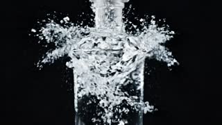 { "scene_description": "Cinematic macro shot of the Aetherium logo—a stylized, crystalline diamond—floating in absolute blackness. The diamond logo slowly dissolves, releasing a shower of micro-fine, shimmering ice particles. These particles rapidly spin and converge, forming the seamless, flawless glass body of the Aetherium vodka bottle. The bottle materializes completely, liquid swirling once and then settling into a glass-like stillness..", "vfx": ["crystalline logo dissolution", "micro-fine ice particle shower", "rapid particle-to-glass assembly", "liquid settling to zero-movement stillness", "perfect mirror reflection on quartz"], "sfx": ["high-frequency crystalline chime on dissolution", "micro-particle wind-chime whisper", "seamless glass materialization hum", "soft, zero-impact landing sound"], "music": "Minimalist ambient electronic score with high-frequency synth pads and deep, clean bass tones, emphasizing purity and precision", "mood": "elegant, pure, minimalist, refined", "ending": "Aetherium vodka bottle standing perfectly upright on the mirror-polished quartz counter, the liquid appearing invisible, the refined label and crystalline cap catching the soft architectural light, with a deep, uncluttered background.", "text_overlay": { "content": "Aetherium - Absolute Purity", "style": "clean, ultra-thin sans-serif, platinum silver, centered bottom-third, slow fade-in" }, "keywords": ["16:9", "vodka", "premium spirits", "Aetherium", "logo reveal", "crystalline", "assembly", "elegant", "minimalist", "cinematic", "hyper-realistic", "purity"] } please create 8 sec